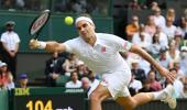 Federer roars into Wimbledon 4th round for 18th time