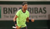 Birthday boy Nadal produces masterclass to advance