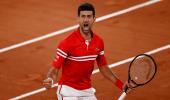 PIX: Nole fends off Berretini, faces Nadal in semis