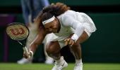 Wimbledon defends 'slippery' courts