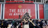 Man United-Liverpool tie postponed as fans storm pitch