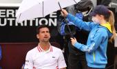 Djokovic fumes at umpire in rain-affected Rome opener