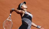 Osaka fined $15,000 after win, warned of expulsion