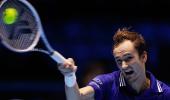 Tennis: Medvedev fights back to sink Hurkacz