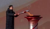 Chinese soldier, Yao Ming at Beijing torch relay