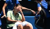 Heartbreak for Tan as she exits Aus Open on wheelchair