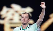 Medvedev channels 'inner Novak' to make semis