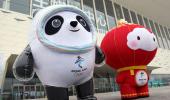 Beijing Games: Hugs discouraged but condoms available