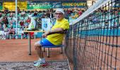 World's oldest tennis player stays put in Ukraine