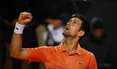 Djokovic keeps top spot after beating Auger-Aliassime