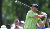 PGA Championship: McIlroy grabs lead as Woods falters