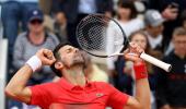 Djokovic keeps title defence on track, Zverev survives