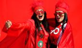 PIX: Morocco, Croatia fans paint the stadium RED