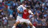 Arsenal down City in shootout to win Community Shield