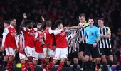 EPL PIX: Leaders Arsenal held, Man United win again