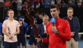 Tennis: Djokovic battles from brink for Adelaide crown