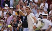 British balloon bursts as valiant Murray fizzles