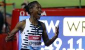 Shocked Kipyegon breaks 5,000m world record