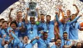 PIX! Champs Man City complete treble!