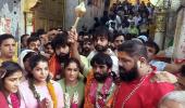 Protesting wrestlers march to Hanuman temple