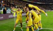 Euro qualifiers: Romania clinch top spot; France held