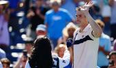 Teary-eyed Isner bids farewell after US Open loss