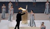 PIX: Paris organisers receive Olympic flame in Athens