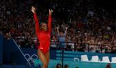 PIX: Biles soars to third gold medal with vault win