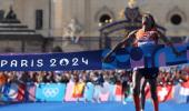 'How is this possible?' Hassan completes marathon gold