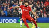 EPL PIX: Salah's brace powers Liverpool to victory