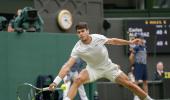 Wimbledon PIX: Alcaraz stretched; Sinner scintillates