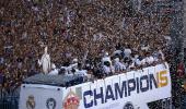 Fans chant 'Toni, stay' as Real parade UCL trophy