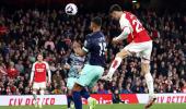 EPL PIX: Arsenal go top; Man United down Everton