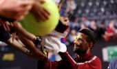 Djokovic hit on head by water bottle at Italian Open