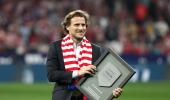 World Cup star Forlan takes up tennis racket