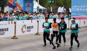 PICS: Humans vs Robots at China Half-Marathon