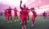 Liverpool thrash Spurs to seal Premier League title