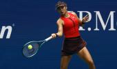 PIX: Raducanu wins first US Open match since 2021