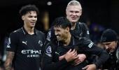 Manchester City survive scare; Spurs hold Newcastle