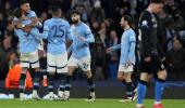 CL PIX: Man City survive scare, Real storm through