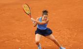 Paolini survives Yuan scare at French Open
