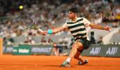 PIX: Alcaraz stumbles into French Open fourth round