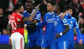 Real Madrid edge Benfica in racism-marred match
