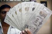 Rupee Falls to 85.64 Against US Dollar