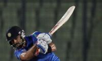 WT20 warm-up: Raina, Kohli guide India to an easy win over England