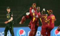 Gayle, Sammy take Windies past Australia in thriller