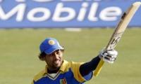 Dilshan hundred as Lanka win rain-marred opener