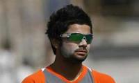 Kohli reprimanded for showing dissent