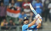 Images: Kohli, Raina seal an easy win