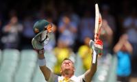 India stage late fightback after Warner's century on Day 1